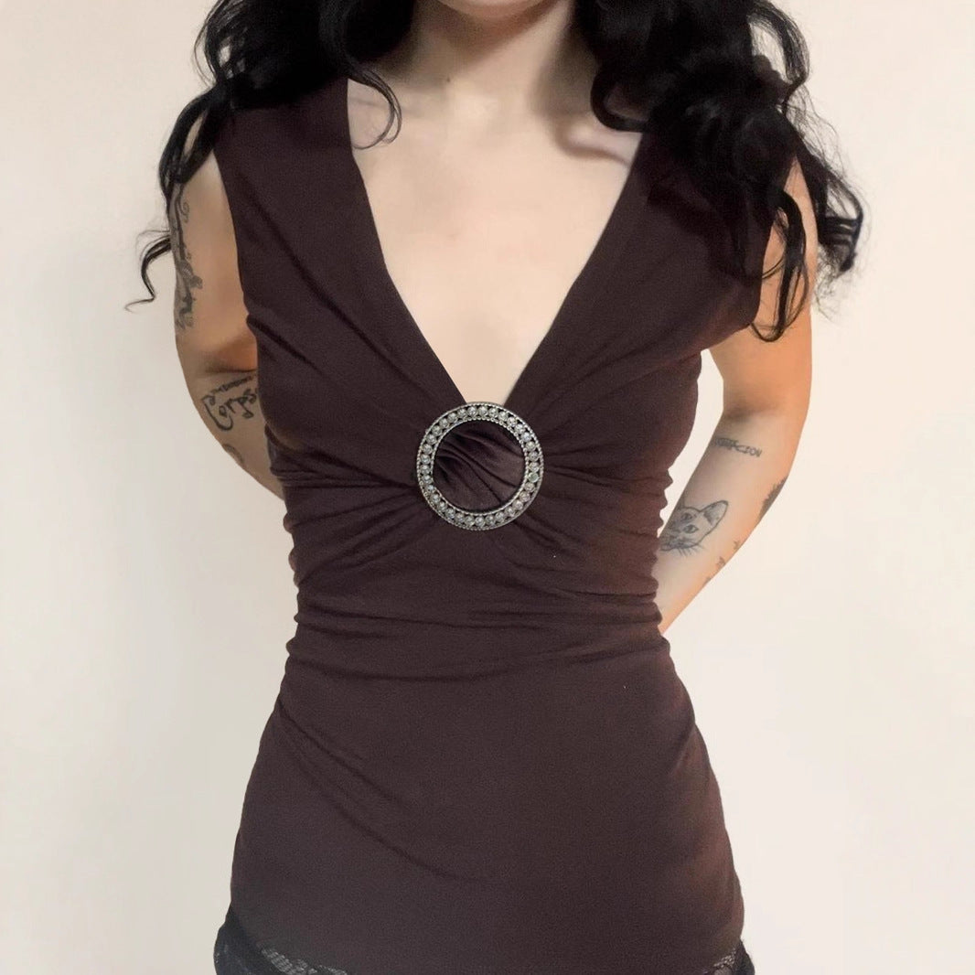 Mature and sophisticated deep V-neck vest with rhinestone ring embellishments