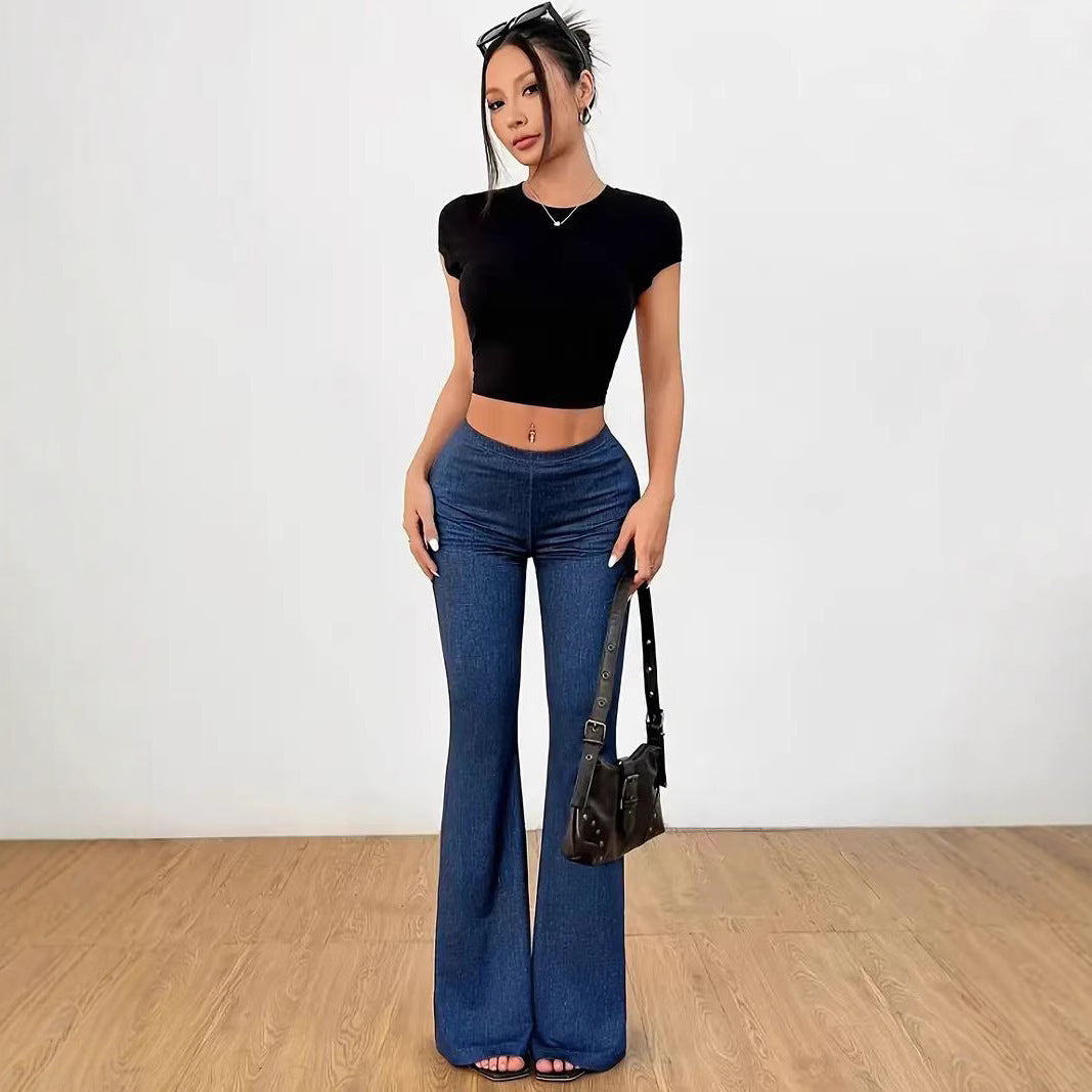 Pantaloni in denim a campana stampati con vita alta