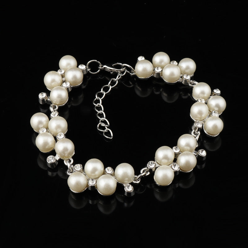 Pearl -cluster en goudkettingarmband