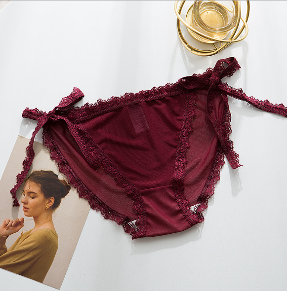Calzoncillos de encaje elegante Ropa interior con pajarita en las caderas