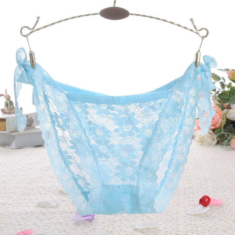 Panty de encaje transparente con lazo a la cadera