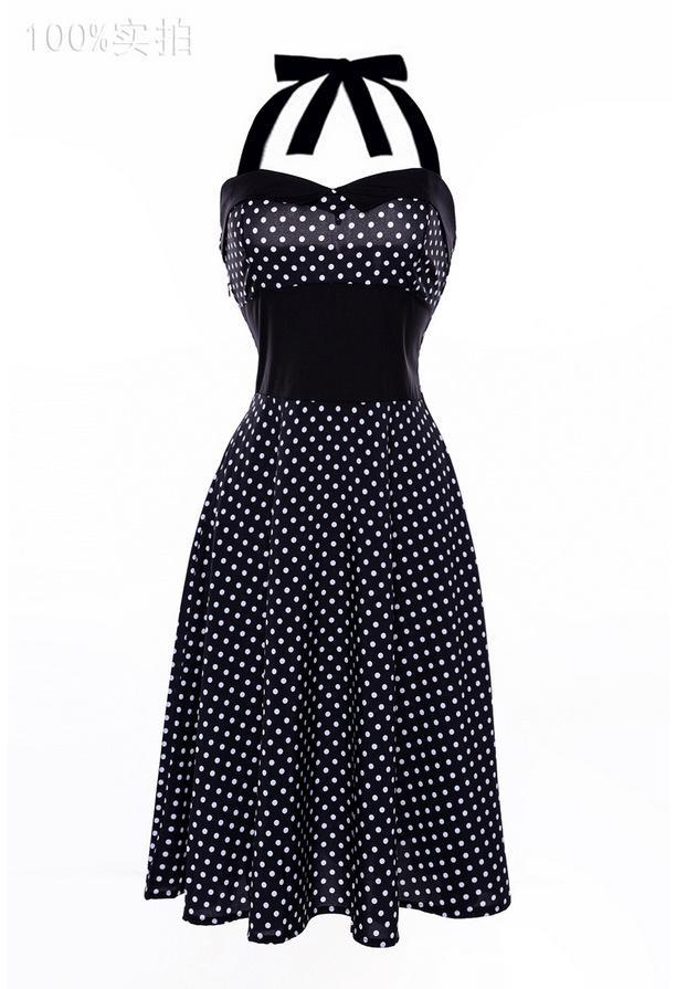 Polka dots en plooien halterjurk